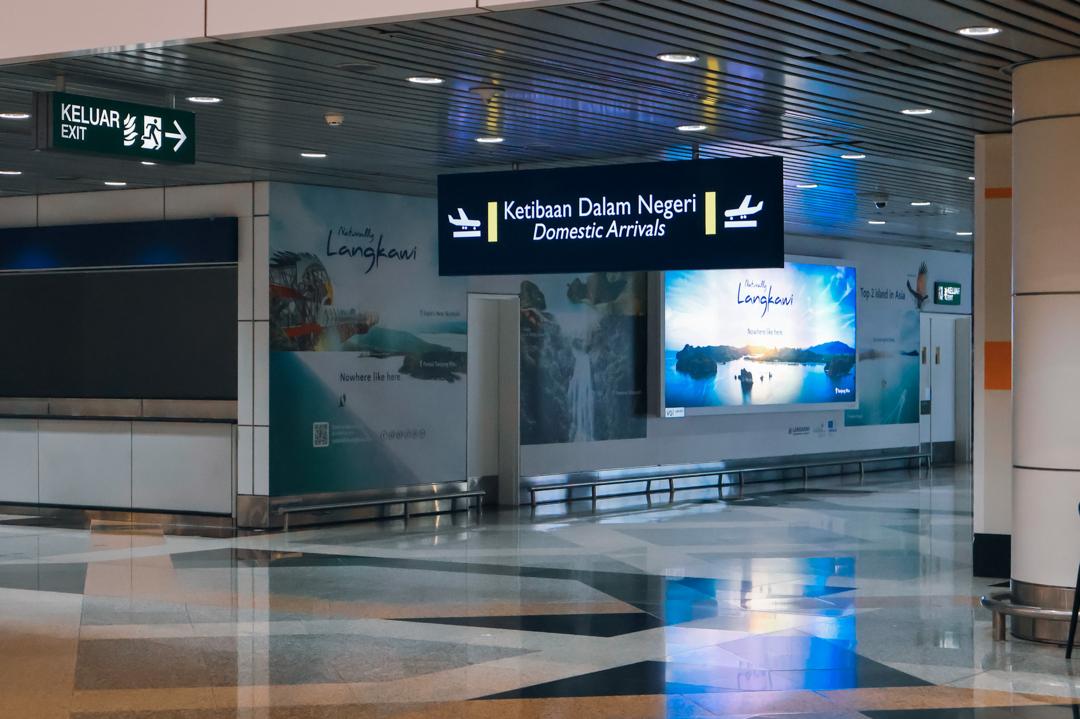 KLIA Terminal 1 domestic arrivals and exit sign